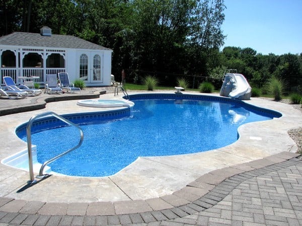 Custom Inground Swimming Pool With Waterslide And Waterfall Installed By Juliano's