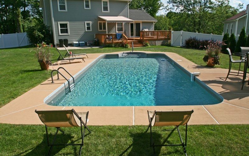 This Is A Photo Of A Patrician In Ground Pool In Windsor, CT With Custom Pavers And Steps.