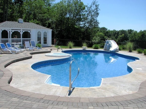 Custom Inground Swimming Pool With Waterslide And Waterfall Installed By Julianos