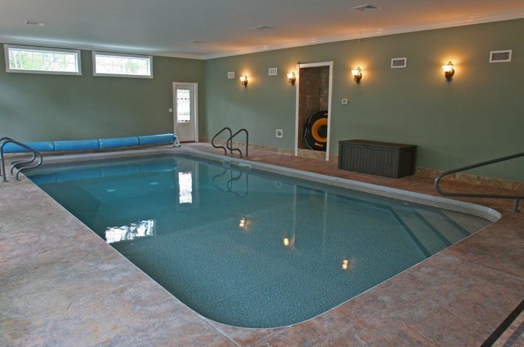 This Is A Photo Of A Custom Rectangular Inground Swimming Pool Indoors With Rounded Corners.