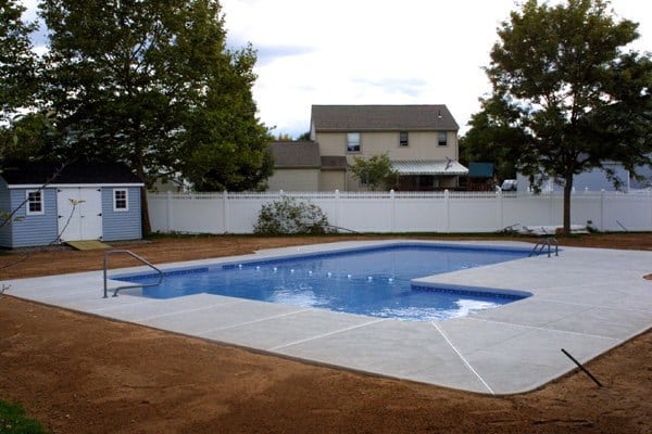 Side View Photo Of A Custom L-shaped Pool Installed By Julianos