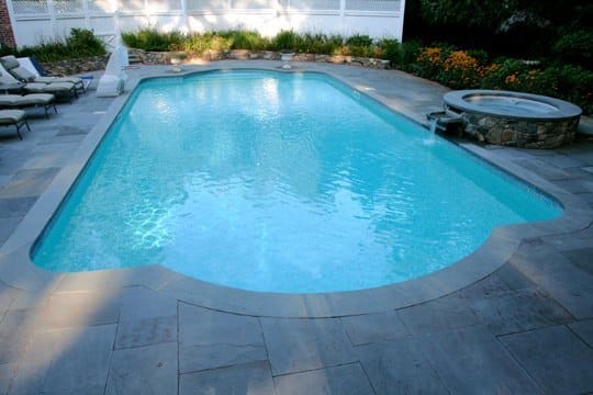 This Is A Photo Of A Roman In Ground Pool In Farmington, CT With Custom Pavers, Spil Over Hot Tub And Basketball Hoop