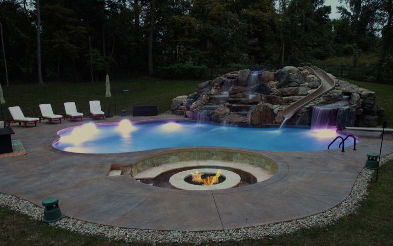 This Is A Photo Of A Night Lit Custom Inground Pool Installed By Juliano's