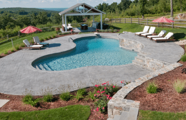 This is an inground pool construction in a country side landscape