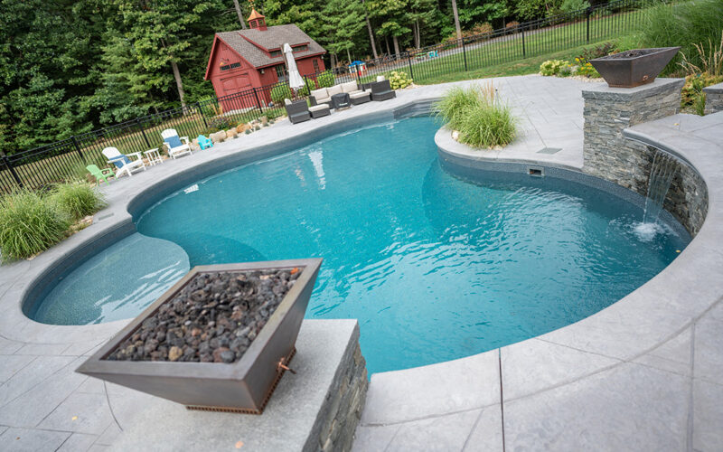 Custom Swimming Pool With Stamped Pavers And Swim-out Located In North Granby, CT