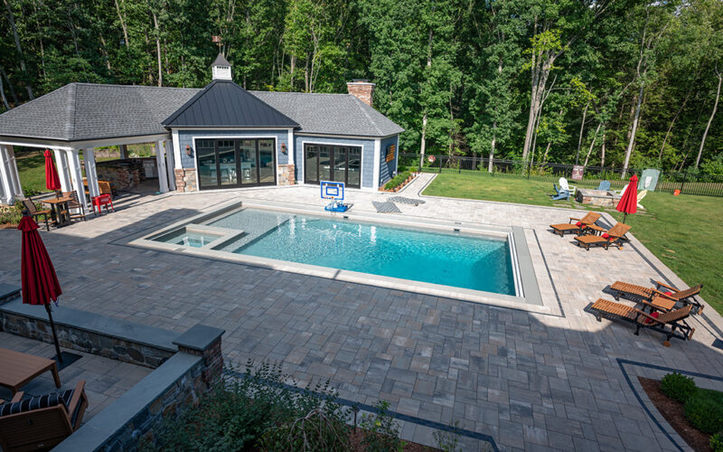 Custom Rectangular Swimming Pool With Swim-out And Inset Tub